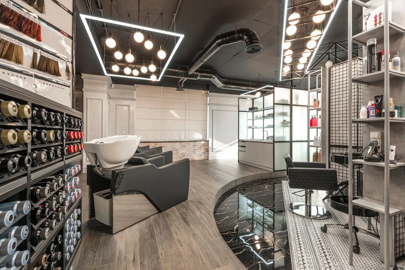 Contemporary salon with wash basins and styling chairs